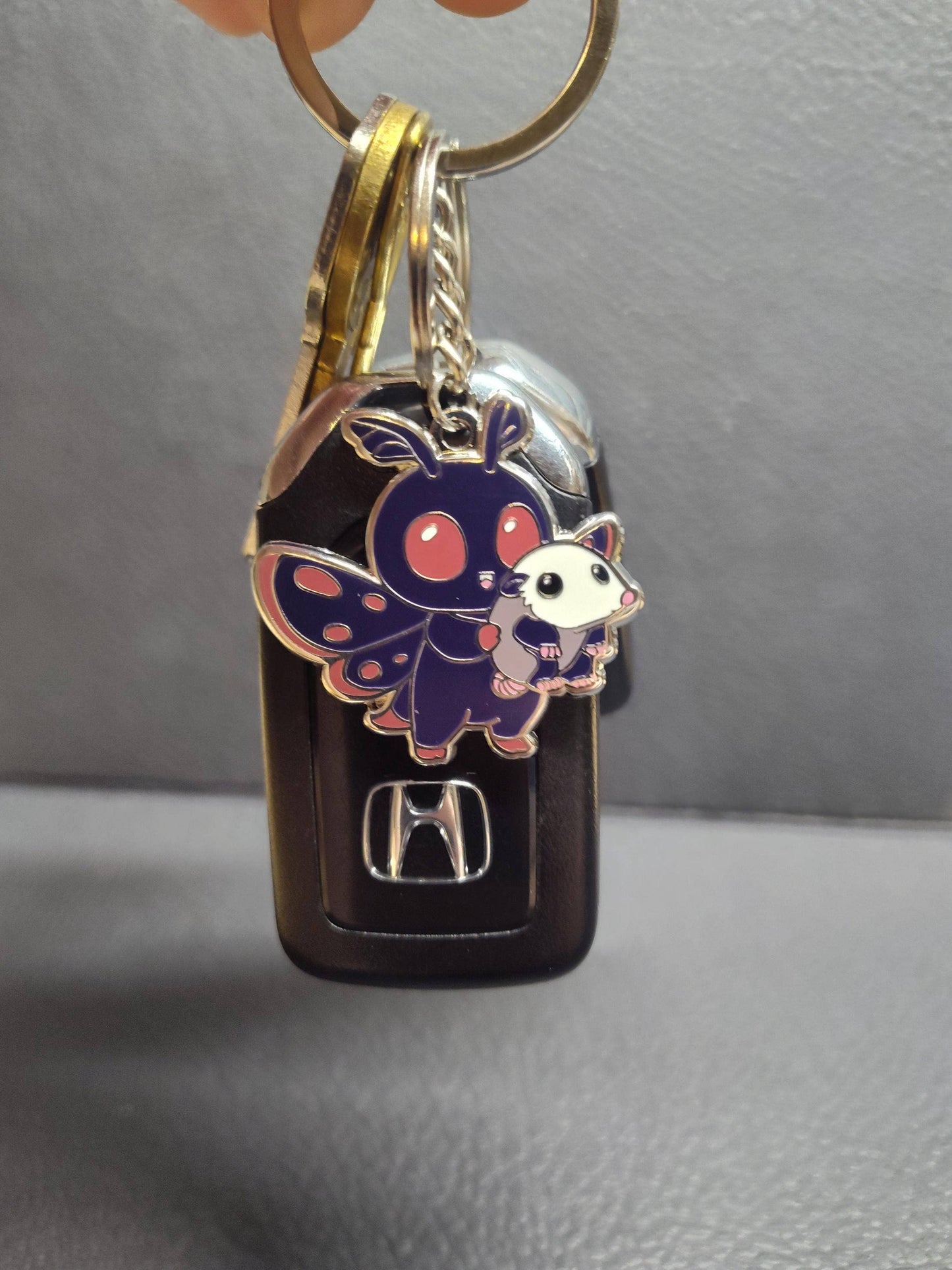 Mountain's Misfits - Mothman w/ Opossum Friend - Collectible Enamel Keychain
