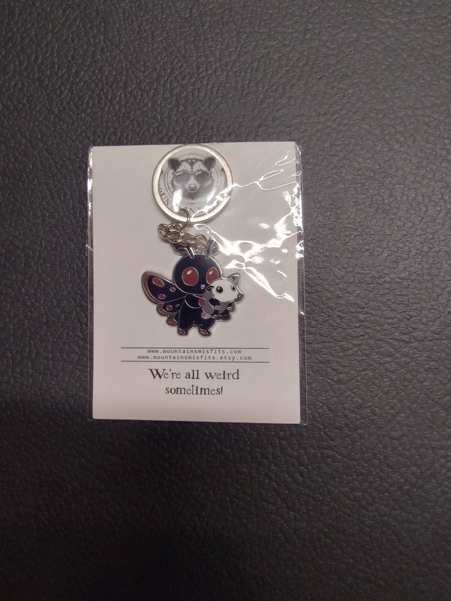 Mountain's Misfits - Mothman w/ Opossum Friend - Collectible Enamel Keychain