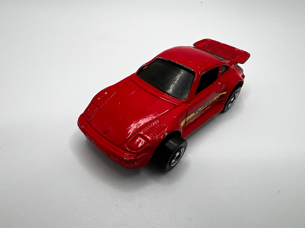 Hot Wheels 1989 Porsche 930 (red w/yellow tampo) loose