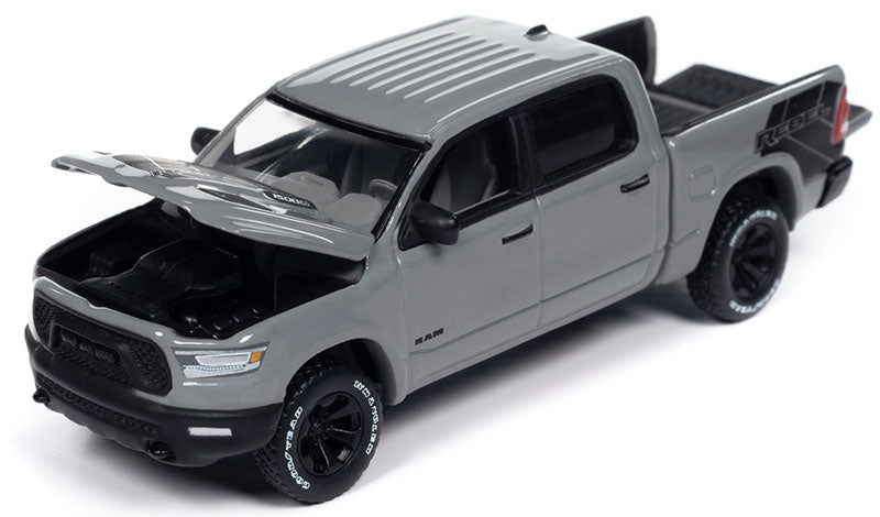 Auto World Premium Muscle Trucks – Chevrolet Silverado R10 Fleetside 1987 (gris poly/noir)