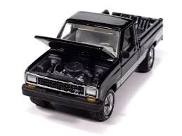 Johnny Lightning Classic Gold - 1987 Ford Ranger STX (Black w/Silver STX Stripes)